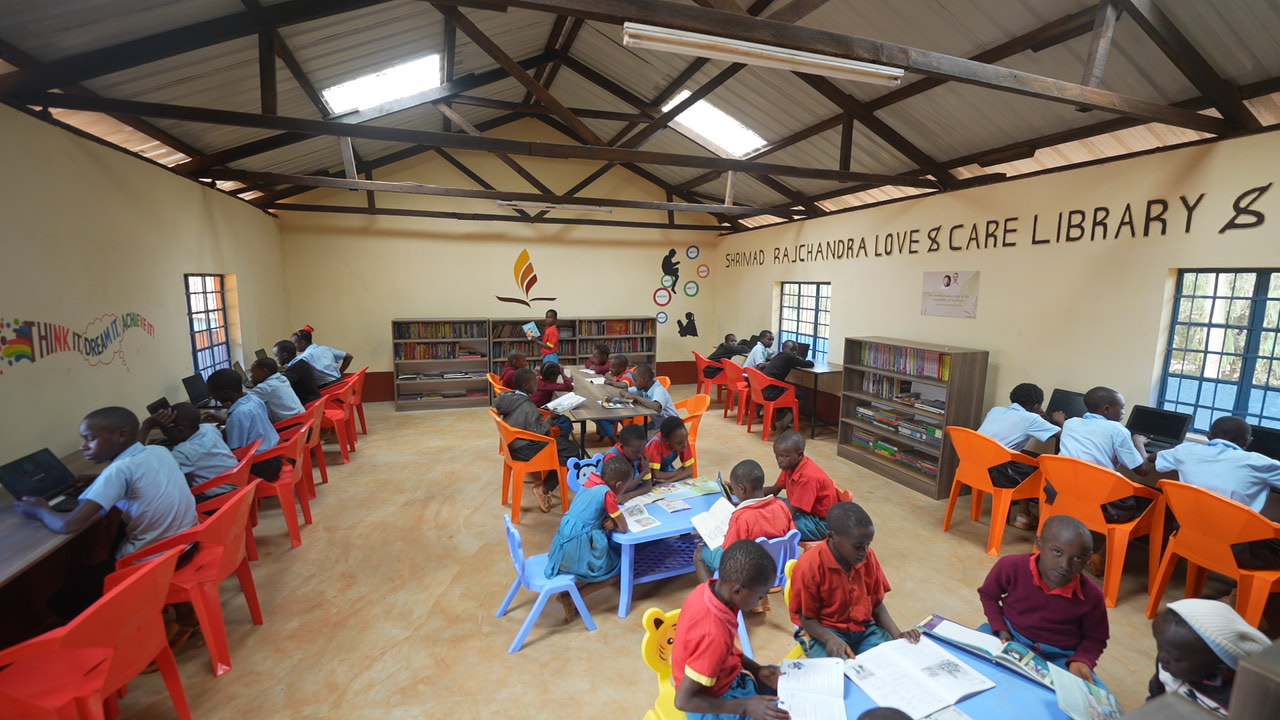 Help develop a library and computer lab