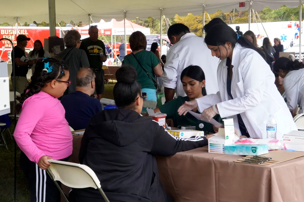 Large community gathering during a wellness event